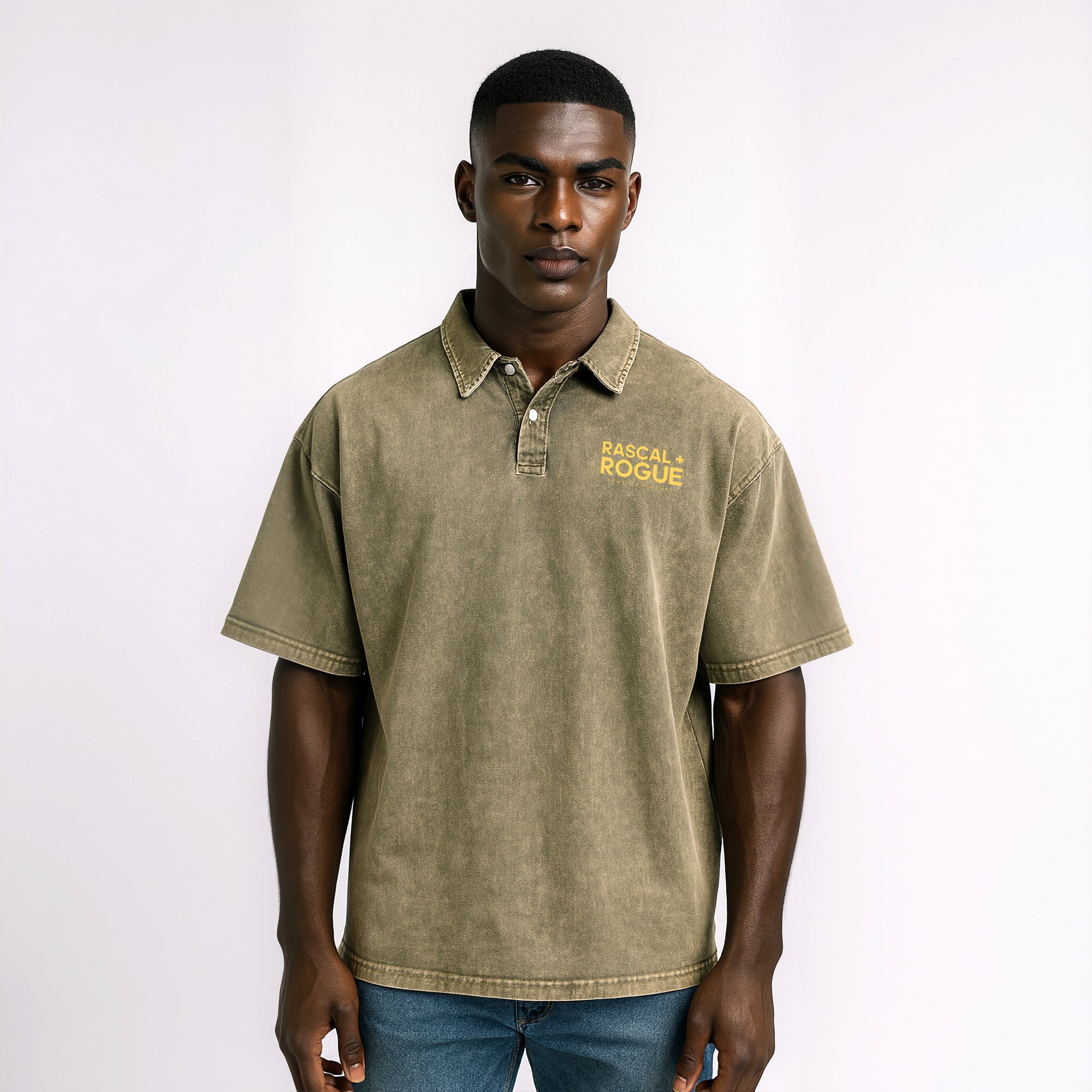 Man wearing a green polo shirt with 'Rascal Rogue' logo on a white background